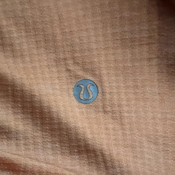Lululemon orange shirt. Size 8-10. Motivational on the inside of the sleeves. - Picture 2 of 4
